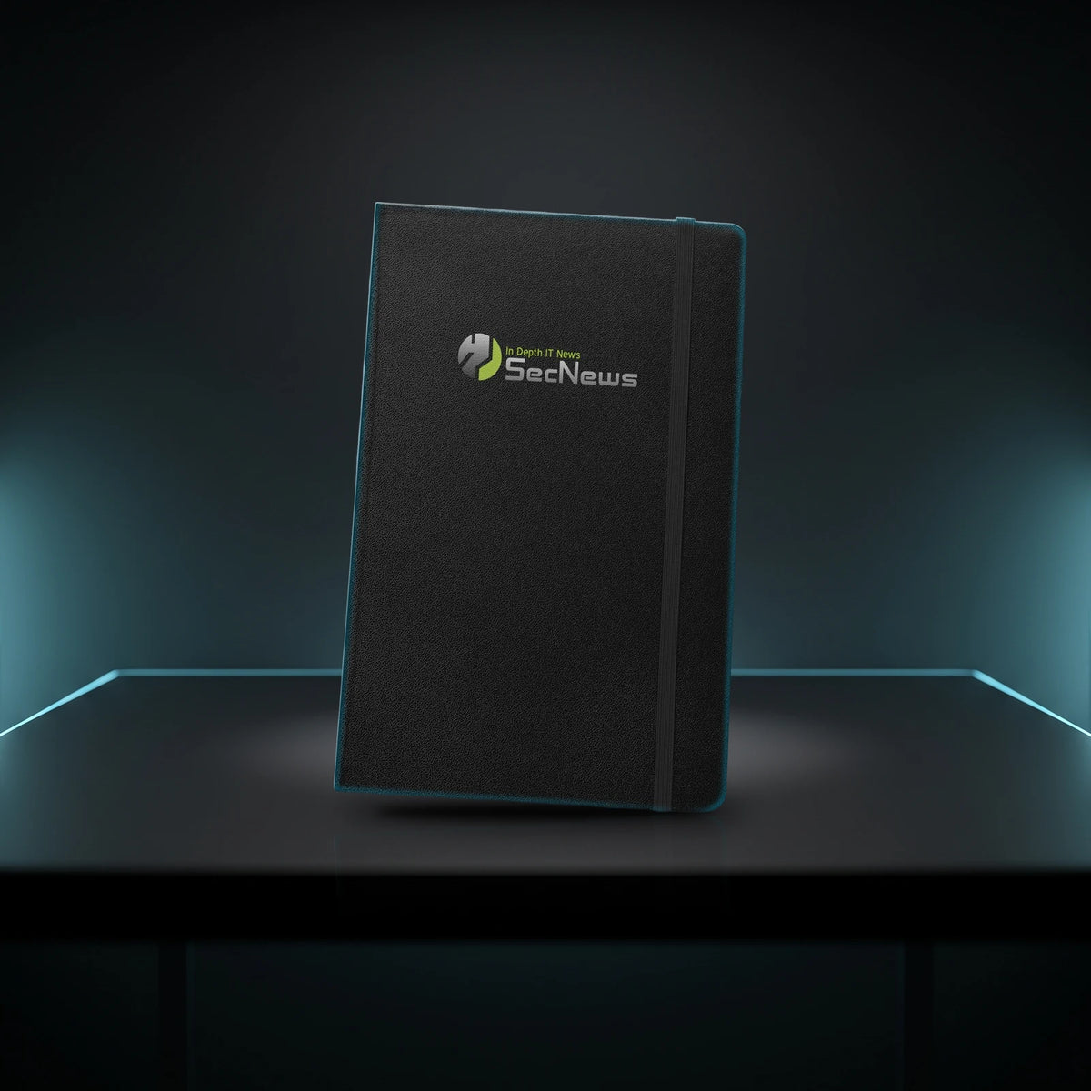 SecNews Elite hardcover notebook in black with the SecNews "In Depth IT News" logo, on a dark desk with cyan rim light